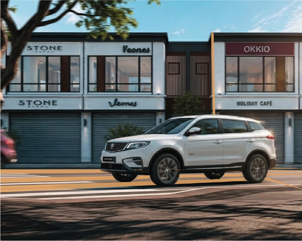 Proton SUV in front of Ionera shopfronts