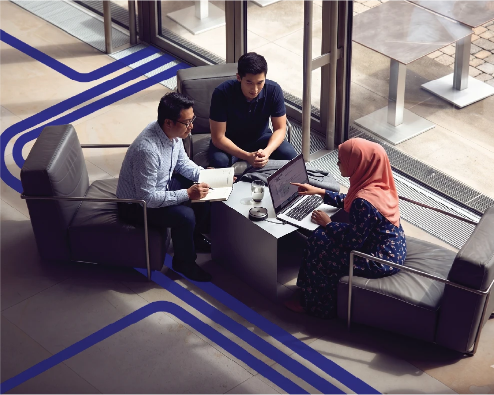 Tech professionals collaborating in a modern co-working space